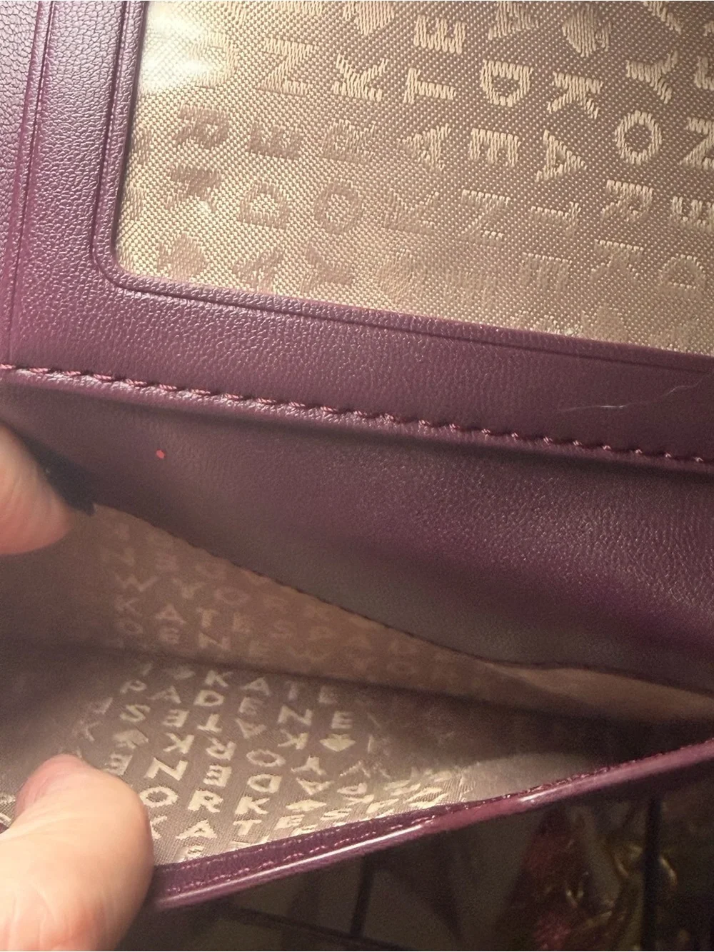 Kate Spade New York Laurel Way Glitter Envelope Wristlet in Deep Plum / Burgundy
